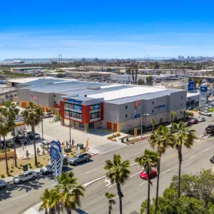 Aerial photograph capturing multiple rows of orange storage units at an A-1 Self Storage location.